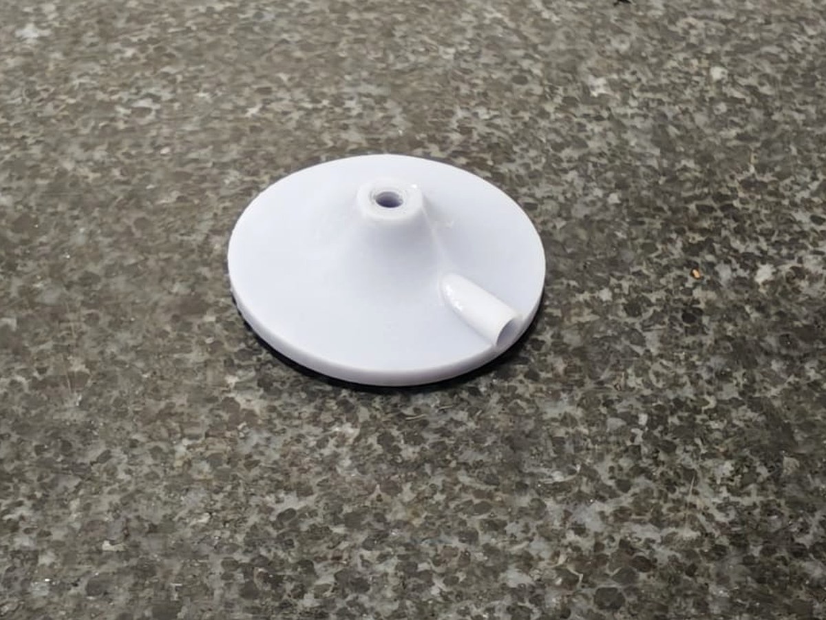 Underside of the HP-S-X1C/H-compatible probe holder showing two raised connection features